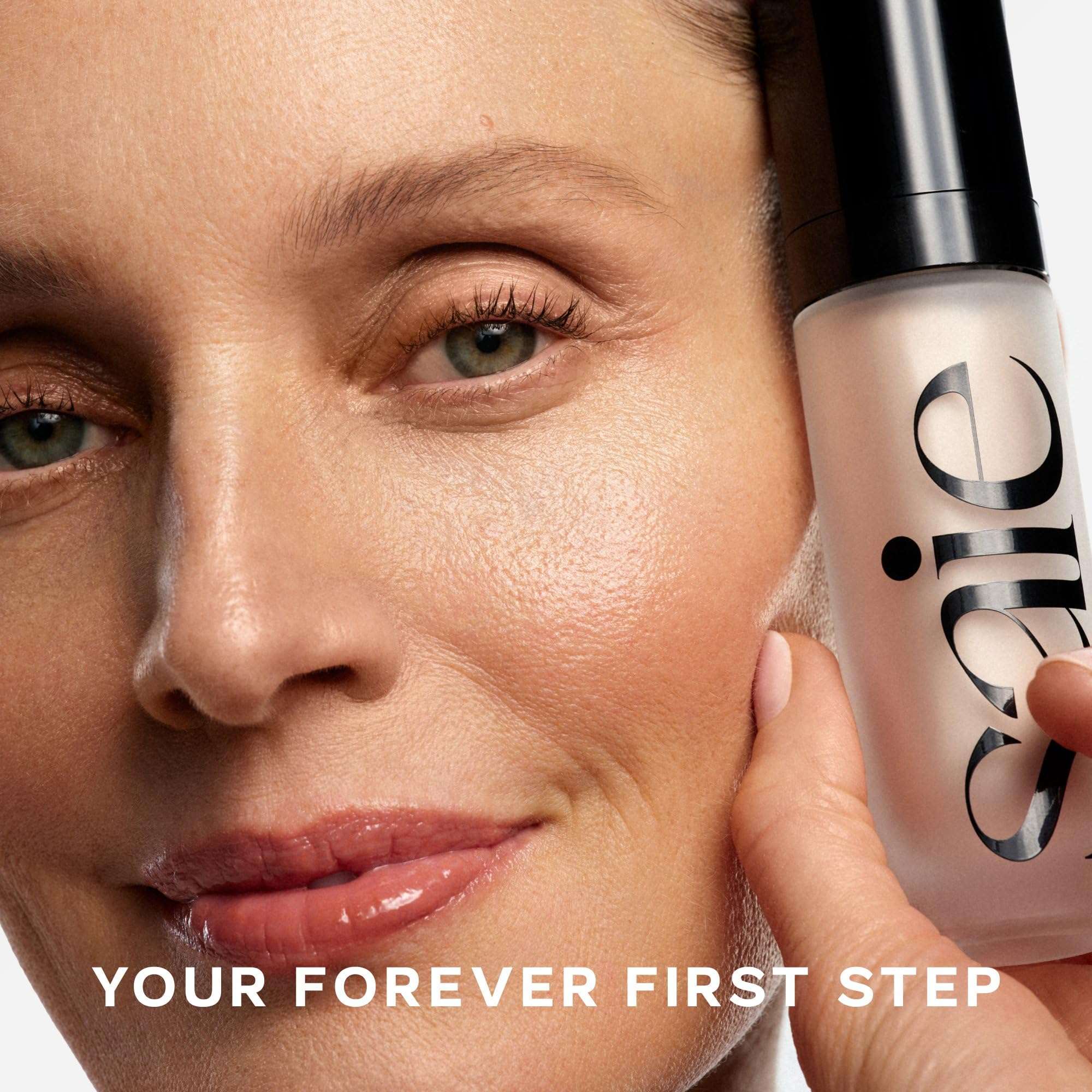 Saie Mini Glowy Super Gel Primer with Vitamin C in Warmglow, a face shaping makeup product with a luminous, radiant finish.