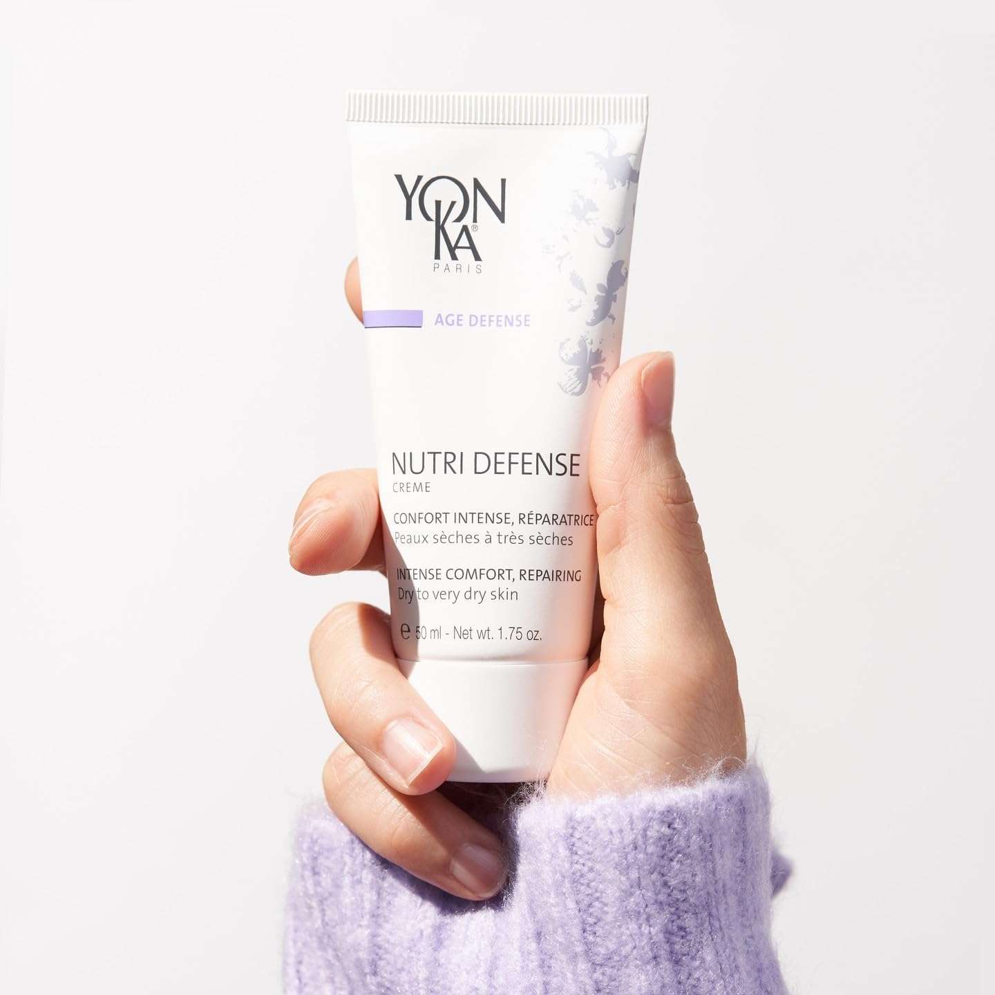 Yonka Nutri-Defense Crème facial moisturizer in 1.7 oz jar, hydrating skincare product for nourishing and protecting the skin.